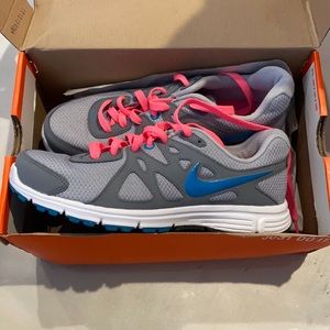 Nike revolutions gray pink and blue women’s